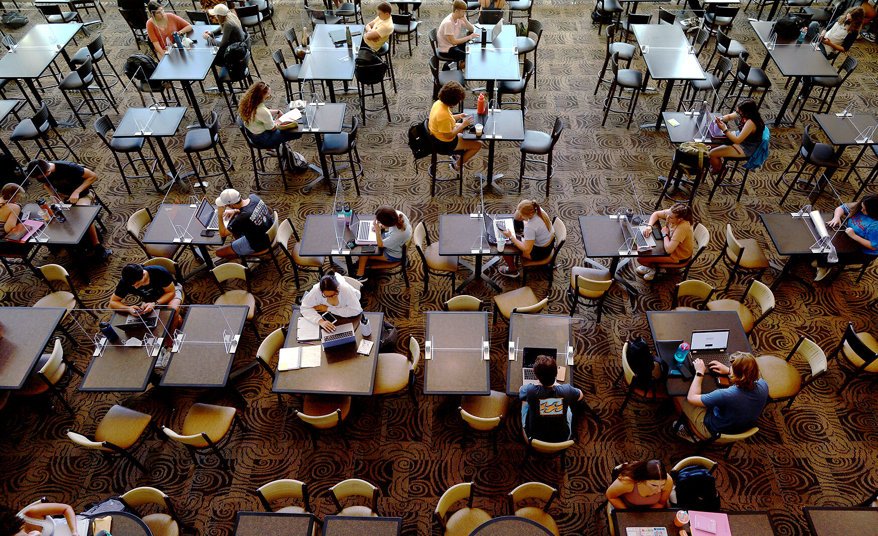MU students sit socially distanced